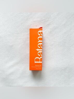 Batana Oil Hair Treatment - Bright Orange Packaging